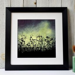 Fiona Gray 'Urban Light' print. Depicting a dramatic Blue & Yellow sky behind urban flower silhouettes