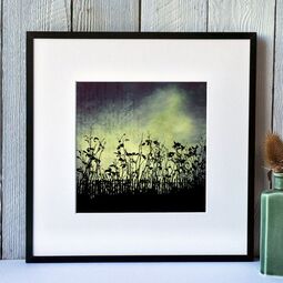 Fiona Gray 'Urban Light' print. Depicting a dramatic Blue & Yellow sky behind urban flower silhouettes