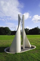 Large White concrete and metal sculpture
